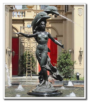 life size lady statue with 2 dolphin